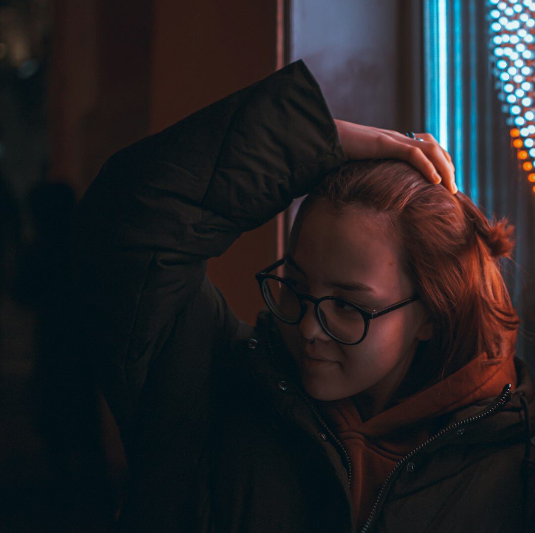 Professional portrait of a Belgian female cybersecurity expert in her 30s